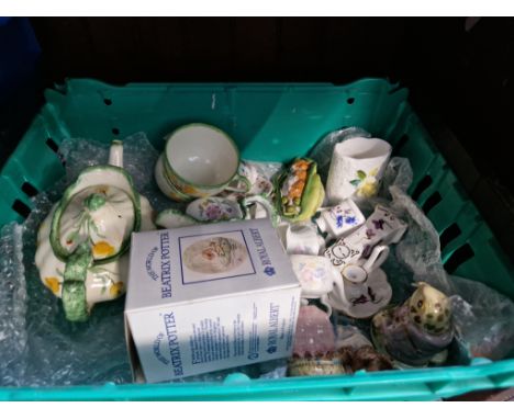 A box of ornaments to include Beatrix Potter, Bramley Hedge and Hammersley miniatures.