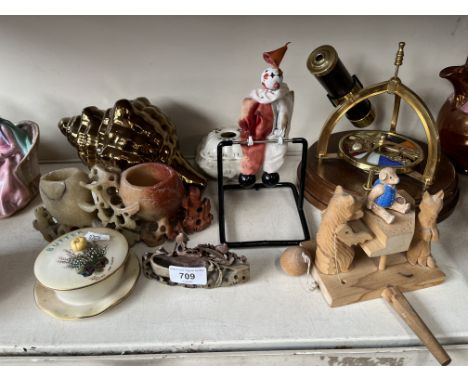 Mixed items including vintage Carlton ware lidded butter dish, soapstone carvings, ceramic conch shell, clown on bar toy, car