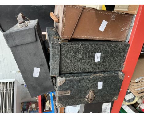A vintage record player and 3 boxes of 78rpm records 