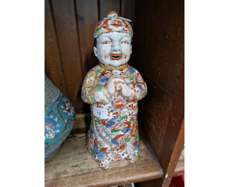A Japanese ceramic figure, height 31cm.
