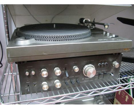 A Rotel RP - 3300 Servo Belt Driven Turntable, (portable appliance tested) and a Technics SU - 3500 Stereo Amplifier (unteste