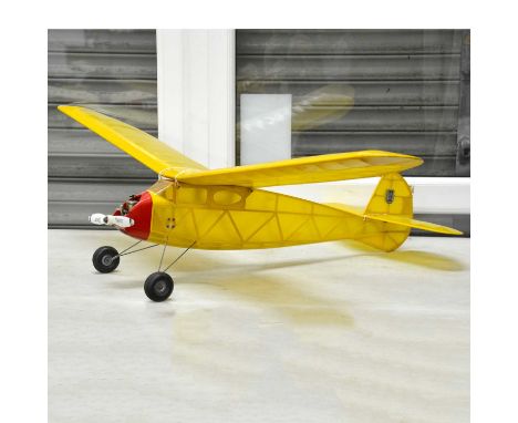 Yellow sports FF model, wingspan 137cm (54 inches), powered by PAW 1.5cc diesel engine, built by Jack Law.