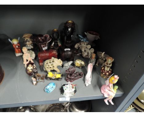 A selection of figures and figurines including elephant's