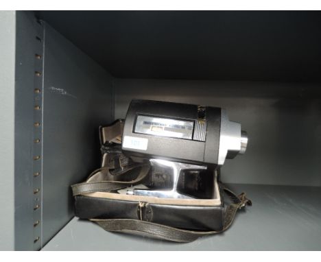 A Bell and Howell automatic 8 mm video camera