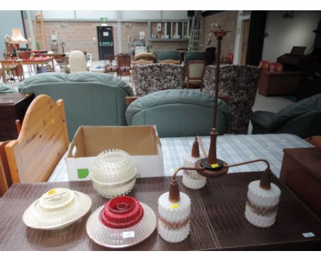 A selection of vintage light fittings and shades