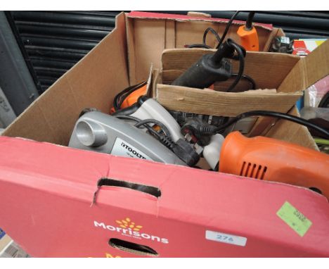 A selection of power tools incluidng circular saw and sander
