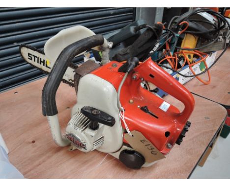 A Stihl 08 s chainsaw with bar and blade