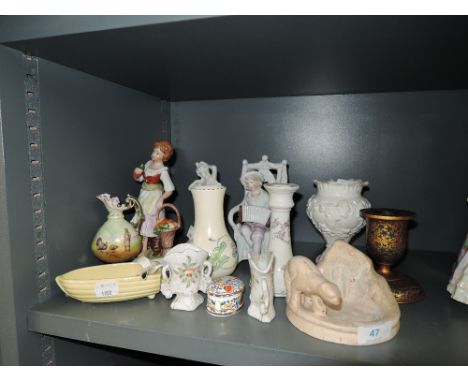 A selection of figures and figurines and similar ceramics