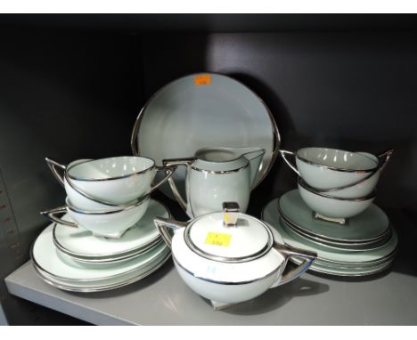 A deco style Bohemia part tea service in duck egg blue and gilt