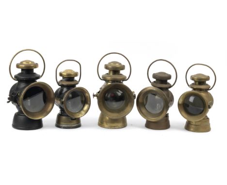 Five assorted Lucas oil-illuminating side-lamps,comprising No.742 with black painted body, spade mounted; another similar lam