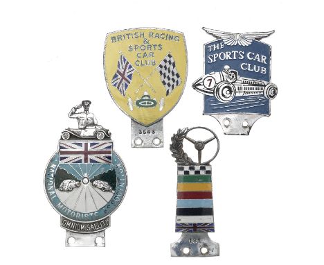 Four motoring badges,comprising National Motorist Association by Collins London, numbered 4113, 14cm high; The Sports Car Clu