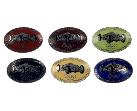 A set of six replica 1935 Auto Union Silver Arrows 'Berlin Olympics' enamel race team badges,each enamelled oval badge featur