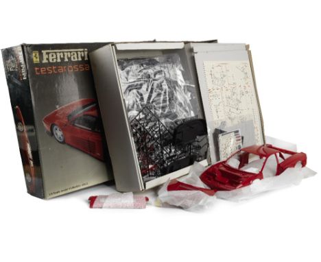 A boxed 1:8 scale Ferrari Testarossa model kit, by Pocher,unconstructed model kit of plastic and metal parts, (Art. K 51), wi