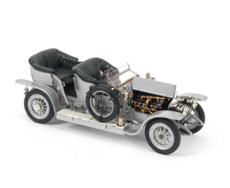 A 1:12 scale model of the 1907 'AX 201' Rolls-Royce Silver Ghost, by Franklin Mint,finely detailed die-cast model from the Co