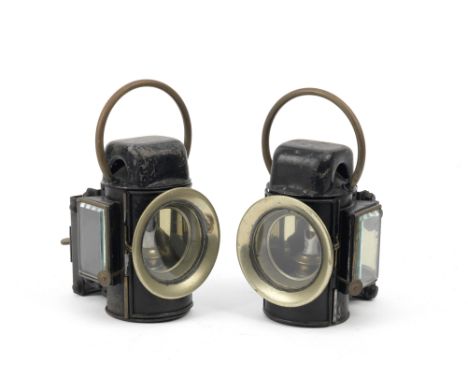 A pair of traction engine/commercial vehicle oil-illuminating side-lamps, by Sherwood Ltd, 1920s,black painted cylindrical bo