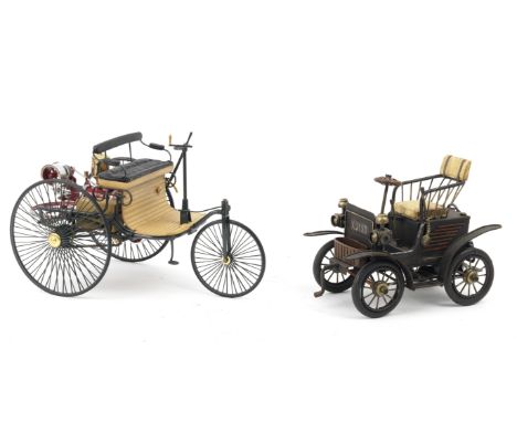 A 1:8 scale model of the 1886 Benz Patent Motorwagen Tri-Car by Franklin Mint,finely detailed die-cast model with rolling whe