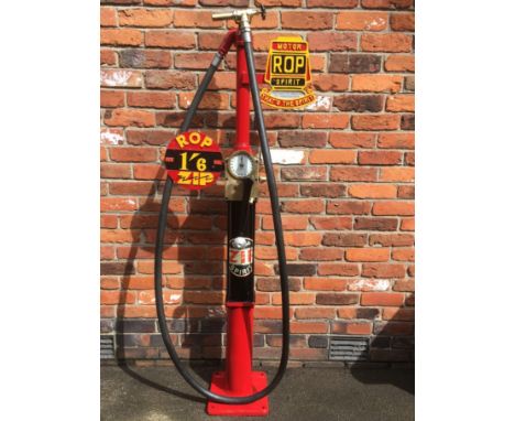 An Avery Hardoll model CH1 one gallon hand-cranked petrol pumprestored in red, black and yellow with Russian Oil Products bra