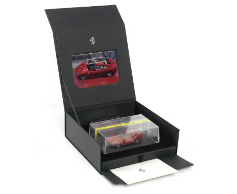 A boxed Ferrari Portofino owner's delivery 1:43 scale presentation model,issued to purchasers of the car, the 1:43 scale mode