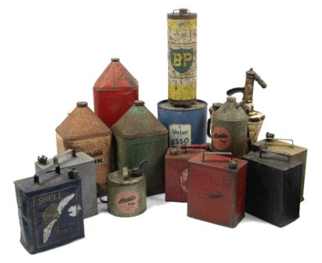 Assorted petrol, paraffin and oil cans,including pyramid topped cans for Mobiloil A, Pink Paraffin and BP Energol tractor oil