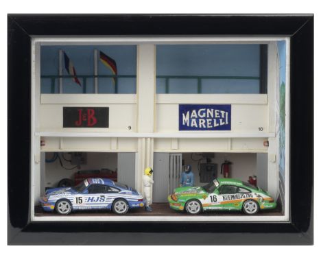 A 'Porsche Super Cup 1993' model diorama by Classic Car Art,a Box Art display comprising two 1:43 scale models of the  Porsch