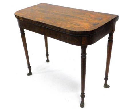 A late Regency rosewood D end fold over card table, the top with a triple wide crossbanding, with baize lined section on tape