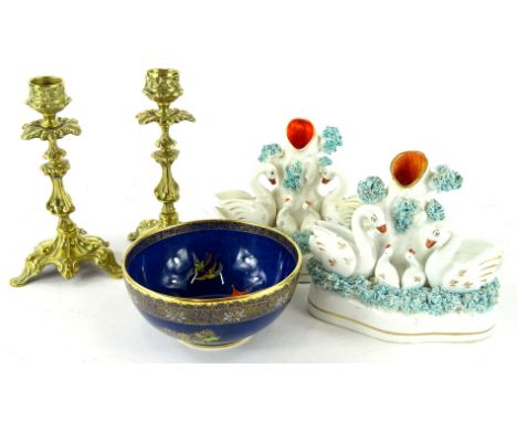 A 20thC Carltonware Bleu Royale bowl, of circular form, 13cm diameter, a pair of 19thC Staffordshire swan spill vase groups, 