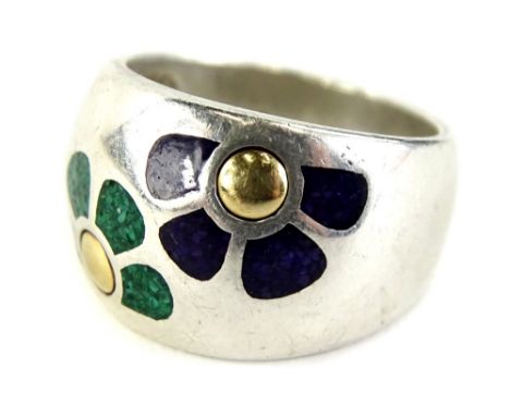 A modern silver dress ring, with design of two flowers in green and purple, with silver hallmark and maker stamp QVC, ring si