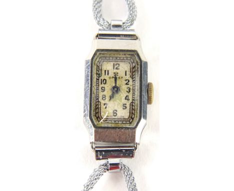 An Omega Art Deco ladies wristwatch, in stainless steel case and two row bracelet, with rectangular watch head, inscribed to 
