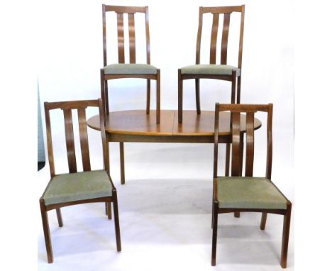 A matched vintage teak G Plan style dining room suite, comprising four chairs with serpentine vertical splats, 90cm high, D e