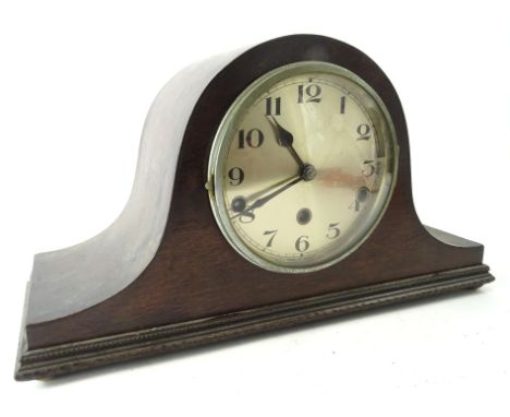 An early 20thC Napoleon hat mantel clock, with shaped case, the 15cm diameter Arabic dial revealing an hour striking chiming 