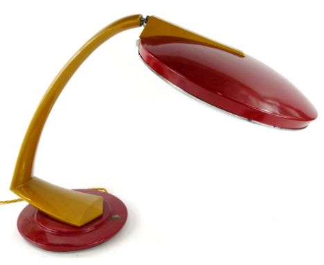 A vintage Spanish 1960's Fase table lamp, in red and gold colours, with circular top, on a fixed stem and stepped base, with 