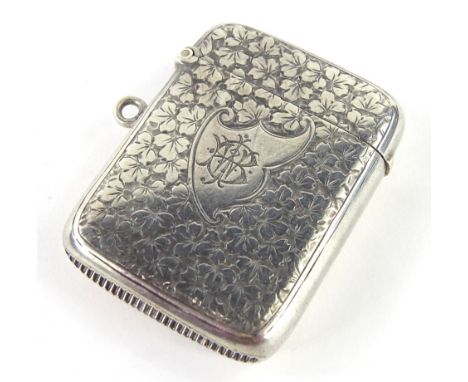 A Victorian silver Vesta case, of rounded form, partially engine turned with initial cartouche and match strike vase, Birming