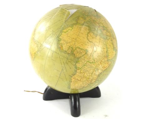 A 20thC Georama 12inch library globe, scale 1:42000000, with Asylum Road Peckham label, on an ebonised base, with electrical 