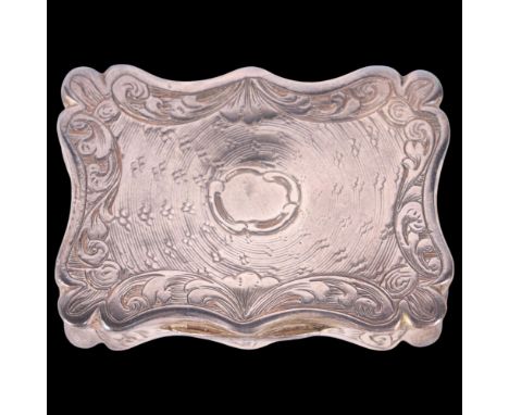 An early Victorian silver vinaigrette, Edward Smith, Birmingham 1844, shaped rectangular form with chased foliate decoration,