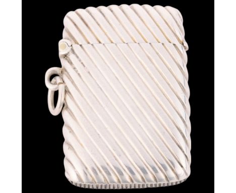 A late Victorian silver Vesta case, Goldsmiths & Silversmiths Co, London 1897, rounded rectangular form with allover fluted s