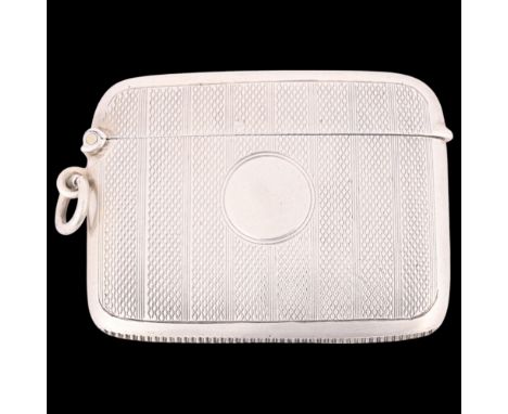 An Art Deco George V silver Vesta case, Henry Matthews, Birmingham 1920, curved rectangular form with allover engine turned d