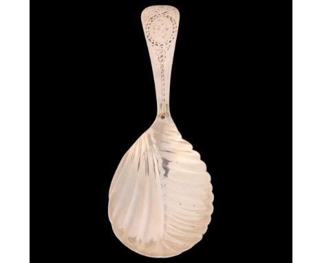 A Victorian silver Old English pattern tea caddy spoon, John Stone, Exeter 1855, relief embossed bowl with bright-cut engrave