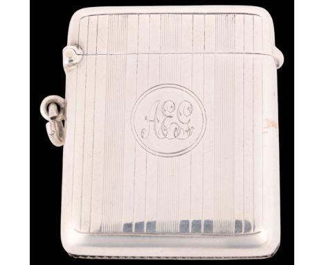 An Art Deco George V silver Vesta case, A&J Zimmerman, Birmingham 1916, rounded rectangular form with engine turned decoratio