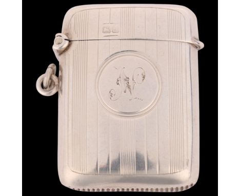 A George V silver Vesta case, Clark & Sewell, Chester 1919, curved rectangular form with allover engine turned decoration and