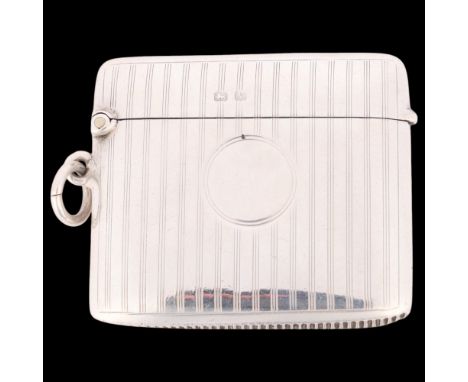 An Art Deco George V silver Vesta case, Henry Matthews, Birmingham 1920, rectangular form with engine turned decoration, 4.5c