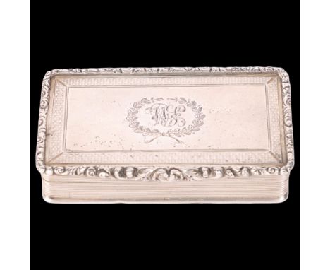 A William IV silver snuff box, Edward Smith, Birmingham 1838, rectangular form with raised cast floral border and thumbpiece,