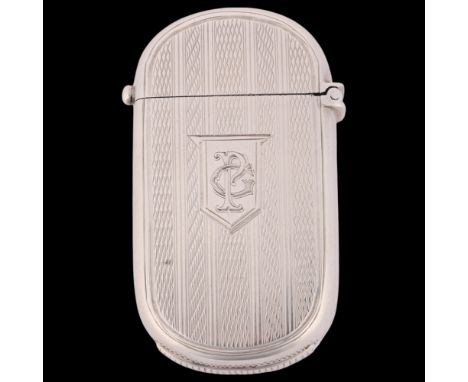 A Victorian silver Vesta case, George Unite, Birmingham 1875, oval form with allover engine turned decoration, 5.5cm x 3cm, 2