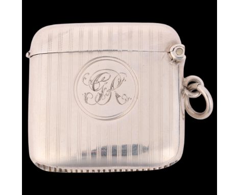 A George V silver Vesta case, Joseph Gloster Ltd, Birmingham 1915, curved rectangular form with allover engine turned decorat