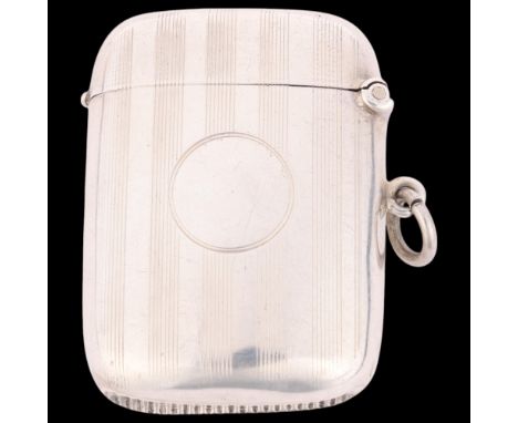 A George V silver Vesta case, Joseph Gloster Ltd, Birmingham 1919, curved rectangular form with allover engine turned decorat