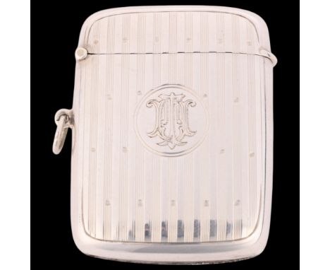 A George V silver Vesta case, Horace Woodward & Co Ltd, Birmingham 1913, rectangular form with allover engine turned decorati