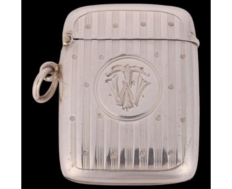 A George V silver Vesta case, Horace Woodward & Co Ltd, Birmingham 1915, rounded rectangular form with engine turned decorati