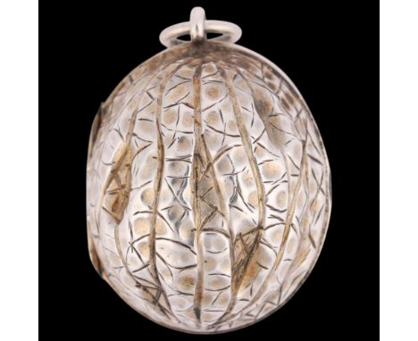 SAMPSON MORDAN & CO - a Victorian novelty silver 'Walnut' vinaigrette, realistically modelled, the interior with pierced and 