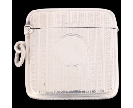 An Art Deco George V silver Vesta case, Henry Matthews, Birmingham 1919, curved rectangular form with engine turned decoratio