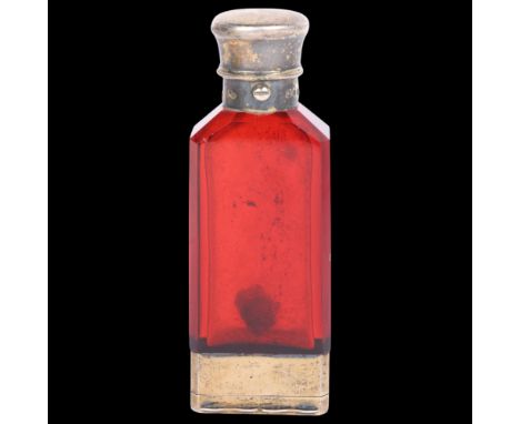 SAMPSON MORDAN & CO - a Victorian novelty silver-mounted ruby glass combination scent bottle/vinaigrette, London 1864, facete