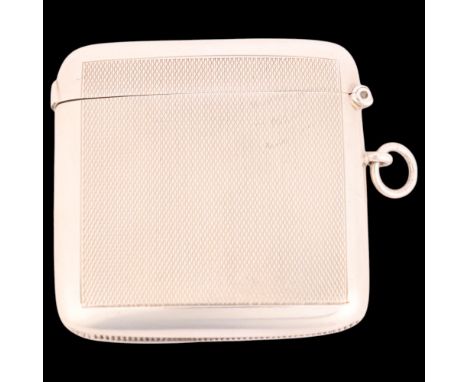An Edwardian silver Vesta case, William Neale & Sons, Chester 1908, curved rectangular form with allover engine turned decora
